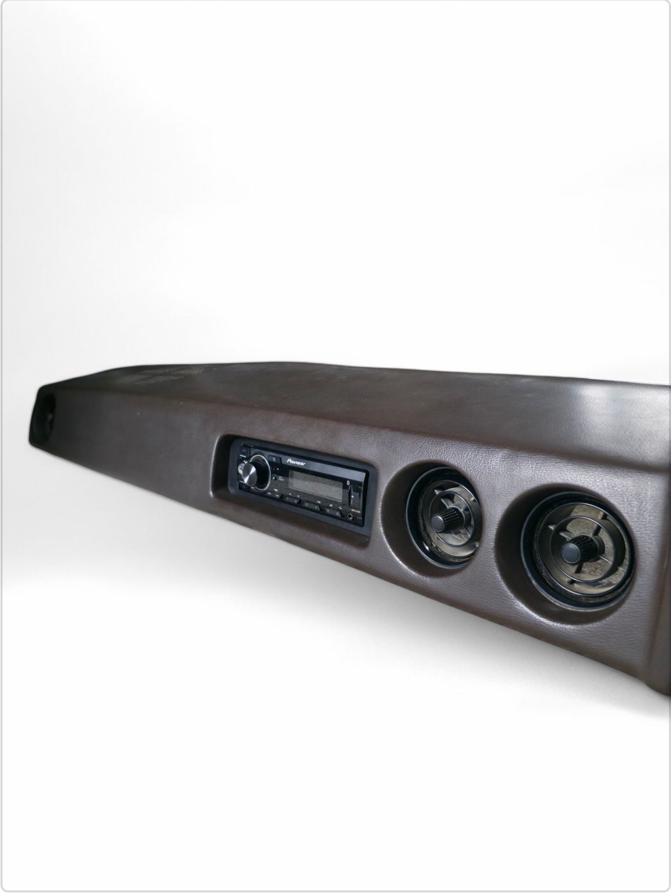60 Series Single Din Mounting Bracket and Fascia Panel Mounted in 60 Series Landcruiser Dashboard