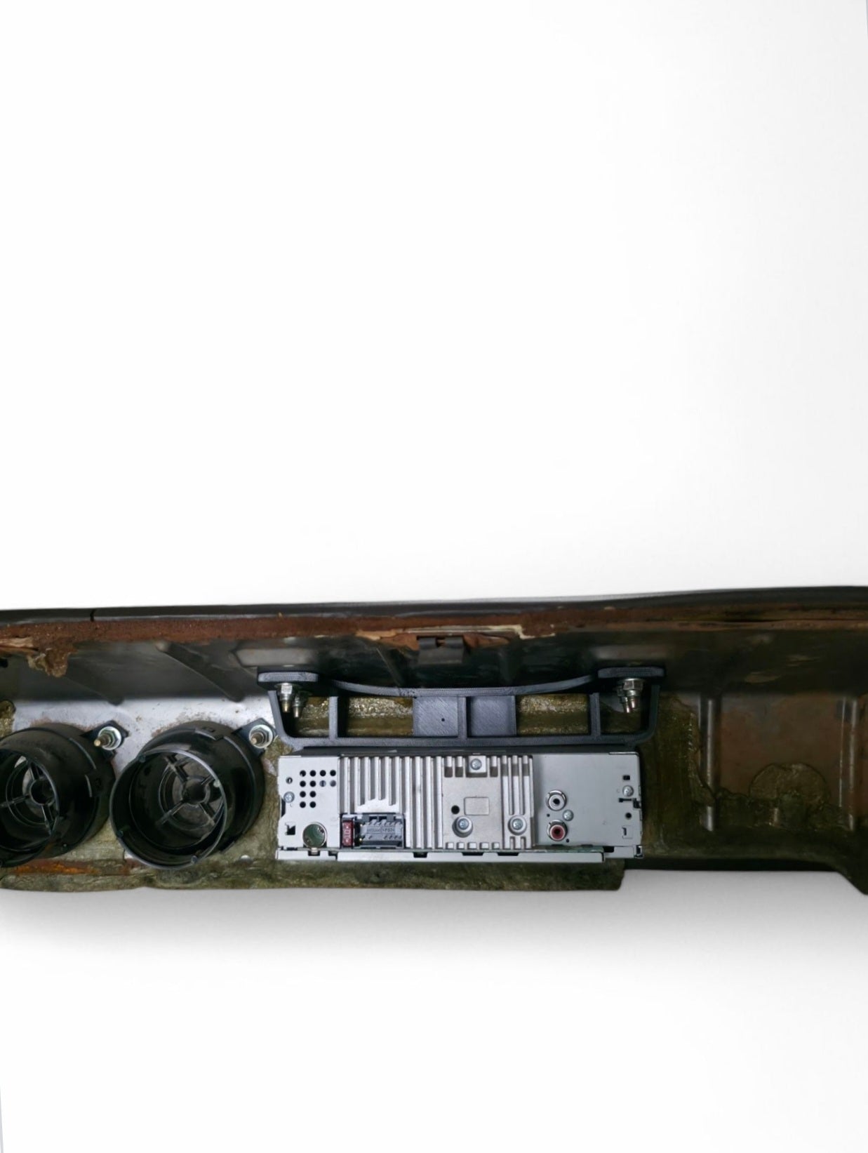 60 Series Single Din Mounting Bracket and Fascia Panel Mounted in 60 Series Landcruiser Dashboard